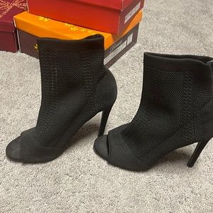 Black, sock style stiletto, size 8